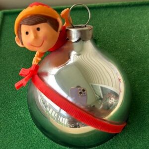 Hallmark keepsake flying Santas flying elf on a Christmas ball
